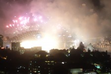 Sydney Opera Hall and Harbor Bridge lit by 2014 fireworks