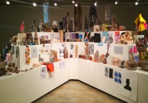a massive pedestal at The Possible with a curated selection of things made during the show