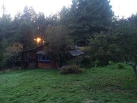 sunset behind Cabin #1 "Orchard" the communal space for shared meals